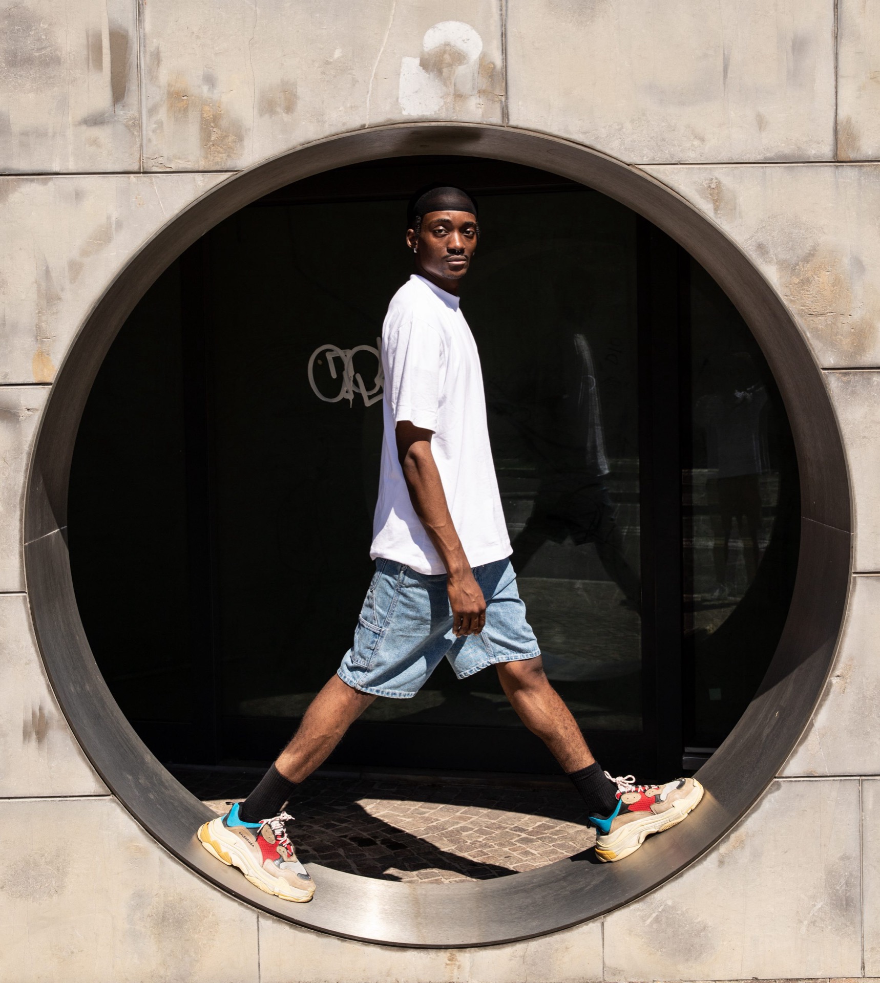 Portrait in a circular window frame