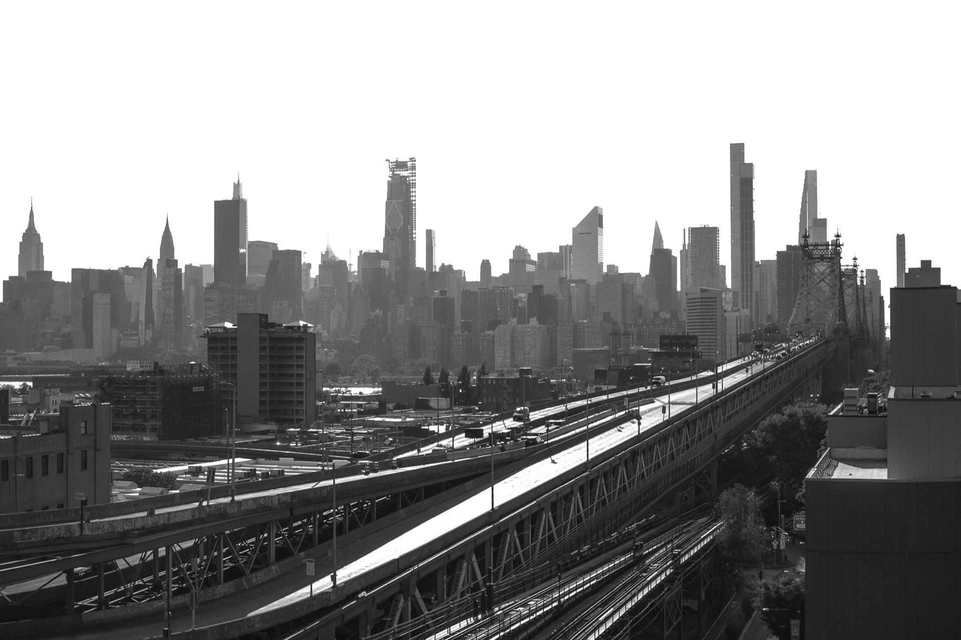 Queensboro Bridge and Manhattan skyline, black and white