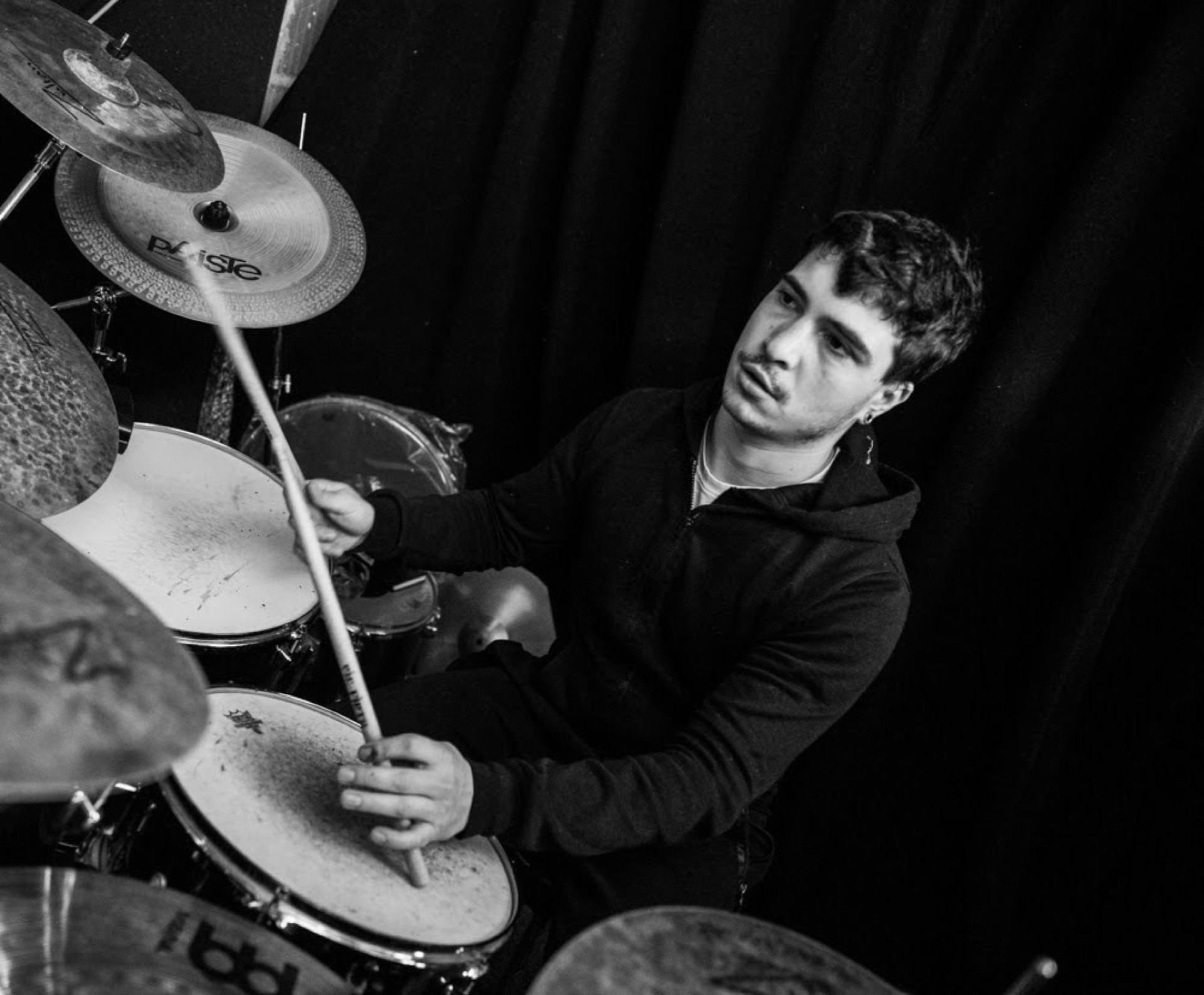 Drummer photographed from above, black and white
