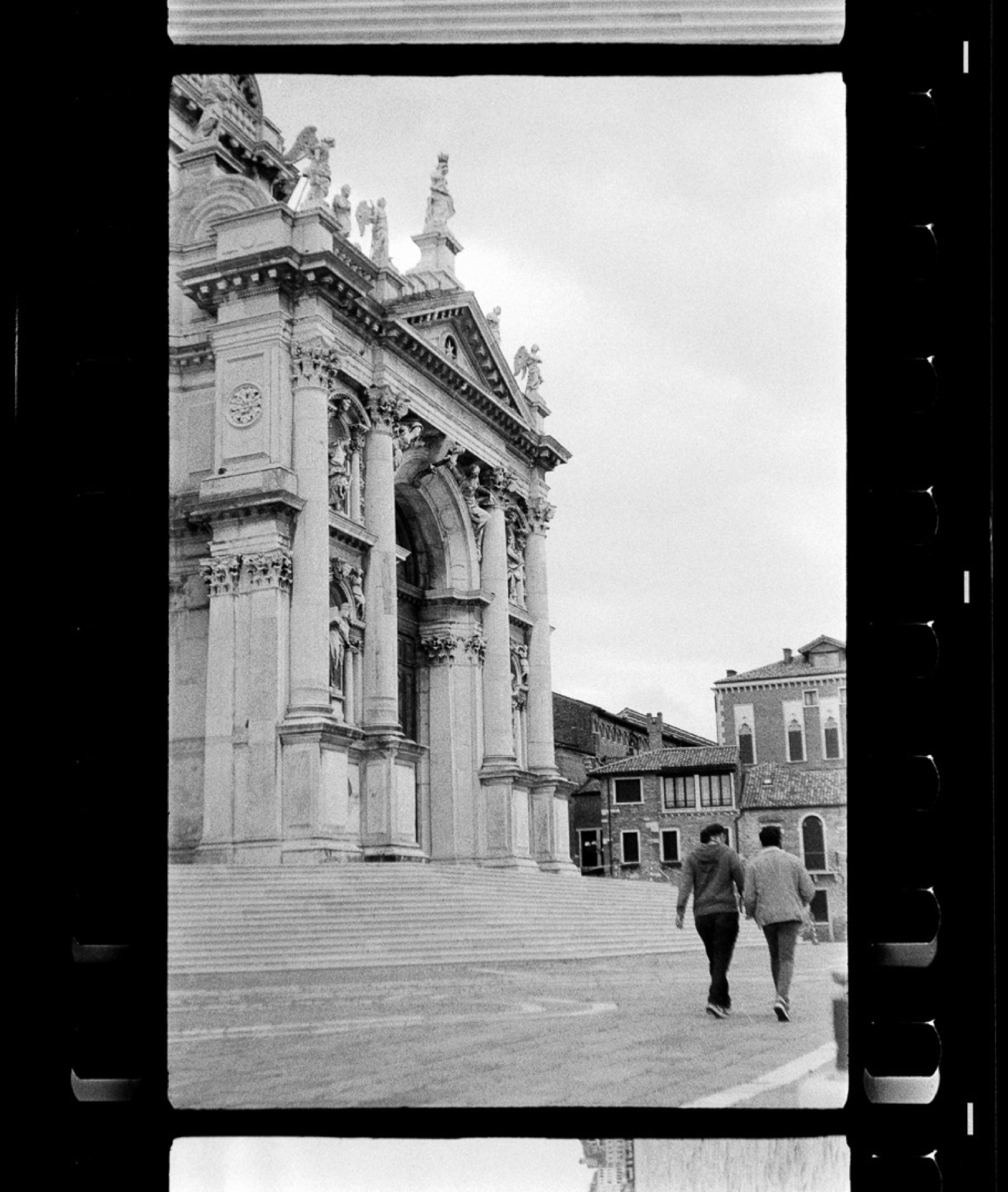 Venetian church facade on film negative strip, black and white